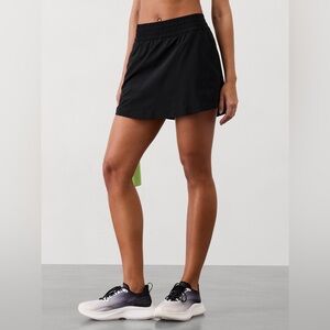 Athleta 14” Run With It Skort in EEUC size M 
Color: black